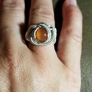 Handmade wire wrapped ring with glass bead